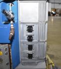 Used Nordson Problue 10 Hot Melt Adhesive Applicator System. Volume 10 liter, melt rate per hour 24 pound, throughput per hour 27.3 pound. Mounted on painted carbon steel frame with casters. Serial# ...